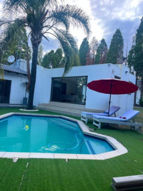 Cozy home with a pool in a leafy suburb of Lonehill, wake up to the sound of trees & birds!!